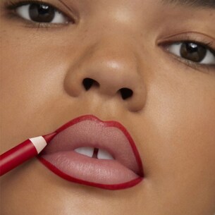photo of woman lining lips with lip liner lip contouring technique